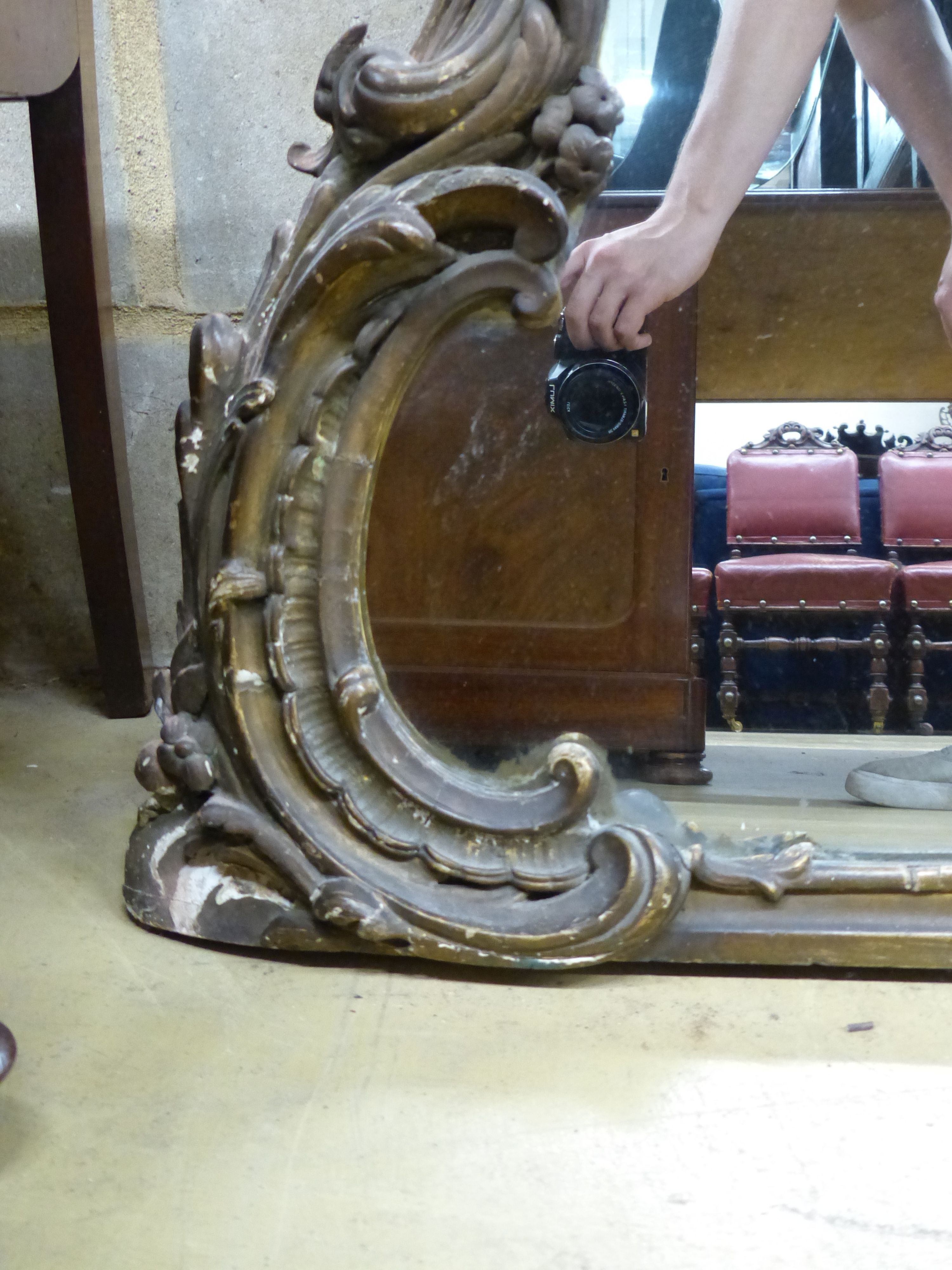 A Victorian carved and giltwoodovermantel mirror (a.f), width 152cm
